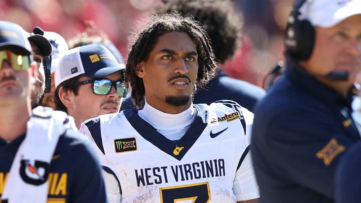 Oct 3, 2026; Ames, Iowa, USA; West Virginia Mountaineers quarterback Michael Hawkins Jr. (3) watches his team play the Iowa State Cyclones during the second half at Jack Trice Stadium. Mandatory Credit: Reese Strickland-Imagn Images Oct 3, 2026; Ames, Iowa, USA; West Virginia Mountaineers quarterback Michael Hawkins Jr. (3) watches his team play the Iowa State Cyclones during the second half at Jack Trice Stadium. Mandatory Credit: Reese Strickland-Imagn Images