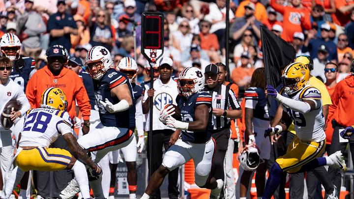 Auburn Tigers running back Omar Mabson II (29) runs the ball as Auburn Tigers take on LSU Tigers at Jordan-Hare Stadium in Auburn, Ala. on Saturday, Oct. 24, 2026. LSU Tigers defeated Auburn Tigers 38-17. Auburn Tigers running back Omar Mabson II (29) runs the ball as Auburn Tigers take on LSU Tigers at Jordan-Hare Stadium in Auburn, Ala. on Saturday, Oct. 24, 2026. LSU Tigers defeated Auburn Tigers 38-17.