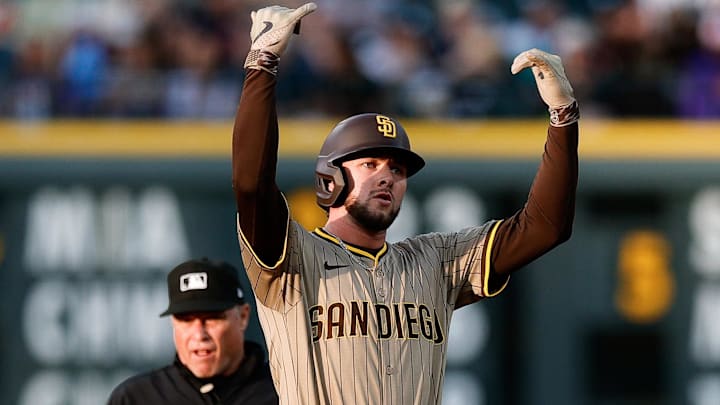 May 9, 2025; Denver, Colorado, USA; San Diego Padres center fielder Jackson Merrill (3) reacts from second on an RBI double in the third inning against the Colorado Rockies at Coors Field. Mandatory Credit: Isaiah J. Downing-Imagn Images