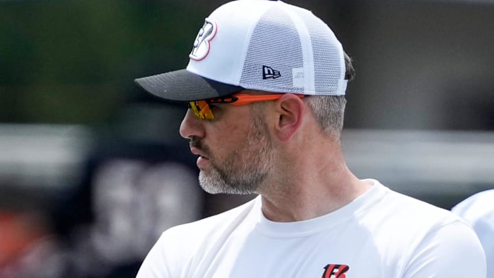 Dan Pitcher watches quarterback drills during a preseason training camp practice at the Paycor Stadium practice field in downtown Cincinnati on Wednesday, Aug. 7, 2024.