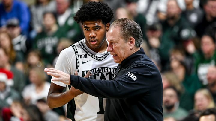 Michigan State's Jase Richardson, left, talks with head coach Tom Izzo during a break in the action in the game against Florida Atlantic on Saturday, Dec. 21, 2024, in East Lansing.