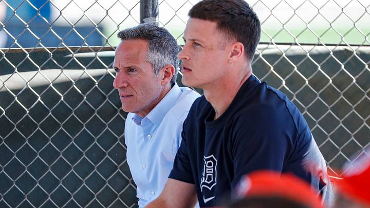 Detroit Tigers chairman and CEO Chris Ilitch talks to pitcher Matt Manning during spring training at TigerTown in Lakeland, Fla. on Tuesday, Feb. 20, 2024. Detroit Tigers chairman and CEO Chris Ilitch talks to pitcher Matt Manning during spring training at TigerTown in Lakeland, Fla. on Tuesday, Feb. 20, 2024.