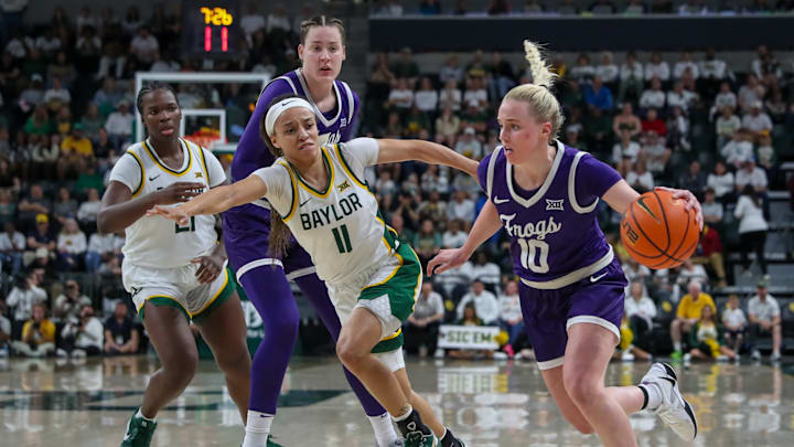 TCU's Hailey Van Lith drives for the basket against Baylor in the final game of the regular season. TCU finished the season as Big 12 champs and the top team in our weekly Power Rankings. Baylor finished second in both. 