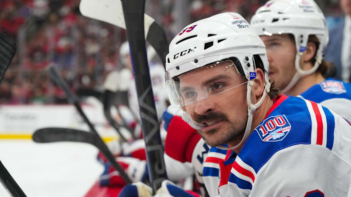 Nov 26, 2025; Raleigh, North Carolina, USA;  New York Rangers center Sam Carrick (39) looks on from the players bench against the Carolina Hurricanes during the first period at Lenovo Center. Mandatory Credit: James Guillory-Imagn Images