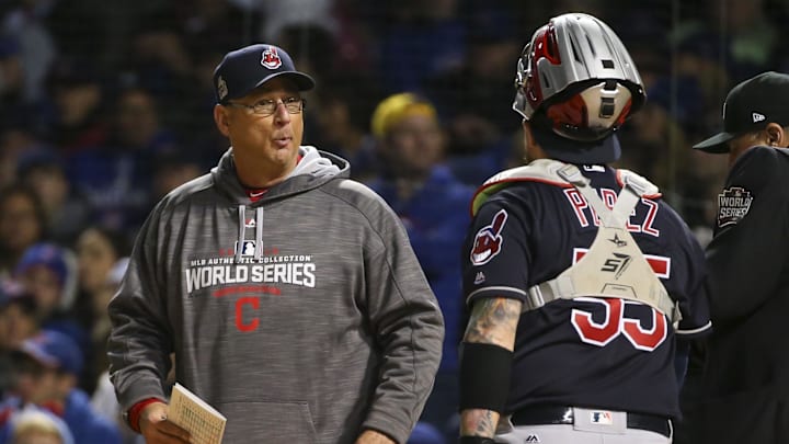 Oct 30, 2016; Chicago, IL, USA; Cleveland Indians manager Terry Francona (left) does a pitching change during the seventh inning in game five of the 2016 World Series against the Chicago Cubs at Wrigley Field. Mandatory Credit: Jerry Lai-Imagn Images