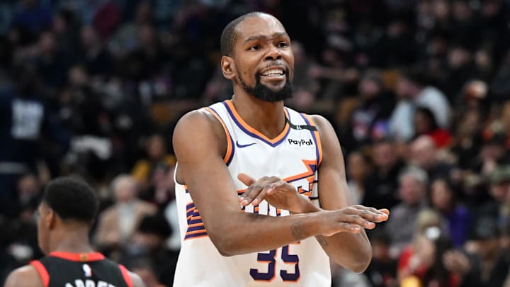 Feb 23, 2025; Toronto, Ontario, CAN;  Phoenix Suns forward Kevin Durant (35) gestures to the referee for a foul call against the Toronto Raptors in the second half at Scotiabank Arena. Mandatory Credit: Dan Hamilton-Imagn Images