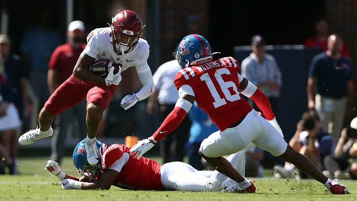 Washington State Cougars wide receiver Tony Freeman (0) runs after a catch as Mississippi Rebels defensive back Wydett Williams Jr. (16) attempts to make the tackle during the second quarter of a 2025 game. Washington State Cougars wide receiver Tony Freeman (0) runs after a catch as Mississippi Rebels defensive back Wydett Williams Jr. (16) attempts to make the tackle during the second quarter of a 2025 game.