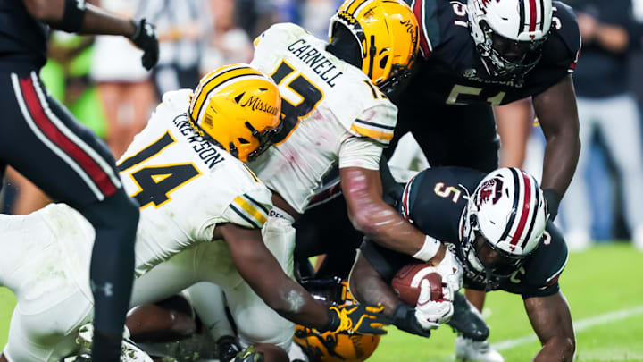 Nov 16, 2024; Columbia, South Carolina, USA; South Carolina Gamecocks running back Raheim Sanders (5) rushes for the game-winning touchdown with 15 seconds left in the game against the Missouri Tigers in the fourth quarter at Williams-Brice Stadium. Mandatory Credit: Jeff Blake-Imagn Images