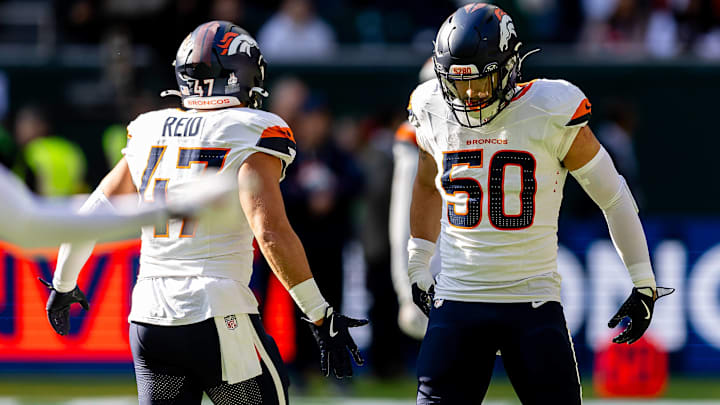 Denver Broncos Linebacker Garret Wallow (50) and Denver Broncos Linebacker Karene Reid (47) warming up before the International Series match between Denver Broncos and New York Jets at Tottenham Hotspur Stadium, London, United Kingdom on 12 October 2025 Denver Broncos Linebacker Garret Wallow (50) and Denver Broncos Linebacker Karene Reid (47) warming up before the International Series match between Denver Broncos and New York Jets at Tottenham Hotspur Stadium, London, United Kingdom on 12 October 2025