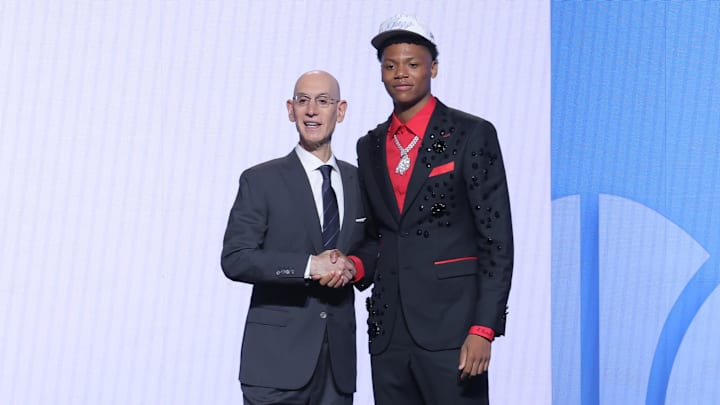 Jun 25, 2025; Brooklyn, NY, USA; Ace Bailey stands with NBA commissioner Adam Silver after being selected as the fifth pick by the Utah Jazz in the first round of the 2025 NBA Draft at Barclays Center. Mandatory Credit: Brad Penner-Imagn Images Jun 25, 2025; Brooklyn, NY, USA; Ace Bailey stands with NBA commissioner Adam Silver after being selected as the fifth pick by the Utah Jazz in the first round of the 2025 NBA Draft at Barclays Center. Mandatory Credit: Brad Penner-Imagn Images