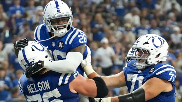 Indianapolis Colts players celebrate Indianapolis Colts running back Ameer Abdullah (26) after Abdullah scores a touchdown Sunday, Oct. 5, 2025, during a game at Lucas Oil Stadium in Indianapolis. The Colts defeated the Raiders 40-6.