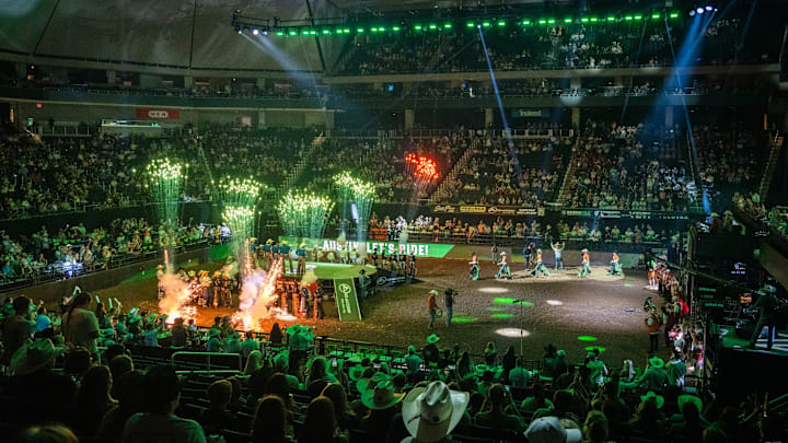 Fireworks light up the arena as the Austin Gamblers walk in during team introductions on the first night of PBR Gambler Days, Friday Aug. 23, 2024 at the Moody Center in Austin. Gambler Days is part of Professional Bull Riding's World Team Series, where teams of riders compete against other teams by adding their scores together, if they manage to stay on the bull for more than eight seconds.