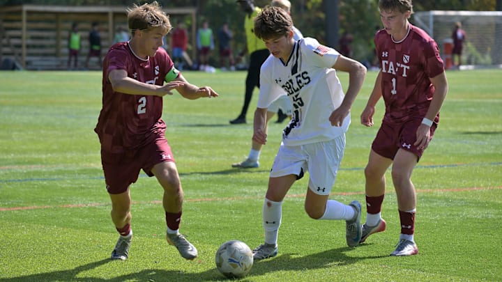 Nobles' Luke Gellert (15) works his way through Taft School defenders at the NXT LVL Showcase in Albany, N.Y. Nobles is up t No. 4 in the Prep Top 15.
