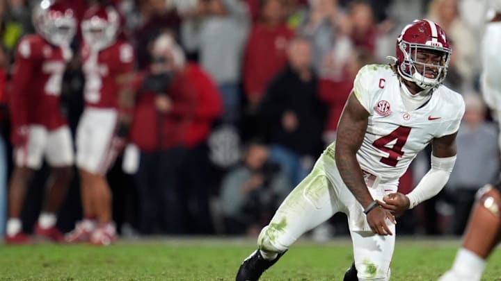 Alabama Crimson Tide quarterback Jalen Milroe (4) gets up after throwing an interception during a college football game between the University of Oklahoma Sooners (OU) and the Alabama Crimson Tide at Gaylord Family - Oklahoma Memorial Stadium in Norman, Okla., Saturday, Nov. 23, 2024. Oklahoma won 24-3.