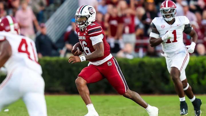 Oct 25, 2025; Columbia, South Carolina, USA; South Carolina Gamecocks quarterback Lanorris Sellers (16) scrambles against the Alabama Crimson Tide in the second half at Williams-Brice Stadium. Mandatory Credit: Jeff Blake-Imagn Images