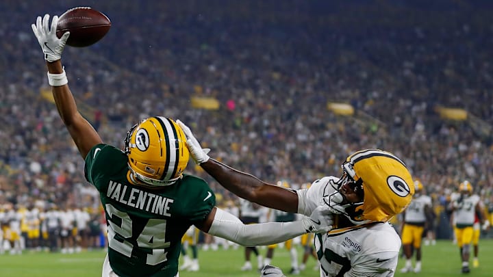 Green Bay Packers cornerback Carrington Valentine (24) breaks up a pass intended for wide receiver Romeo Doubs (87) during Family Night on Saturday, August 2, 2025, at Lambeau Field in Green Bay, Wis. 
Tork Mason/USA TODAY NETWORK-Wisconsin