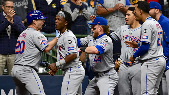 Pete Alonso is greeted by teammates after a huge home run. Pete Alonso is greeted by teammates after a huge home run.