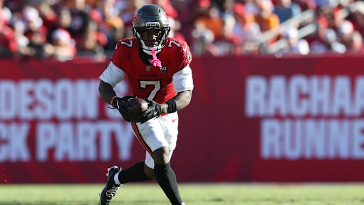 Nov 30, 2025; Tampa, Florida, USA; Tampa Bay Buccaneers running back Bucky Irving (7) runs during the second half against the Arizona Cardinals at Raymond James Stadium. Mandatory Credit: Nathan Ray Seebeck-Imagn Images