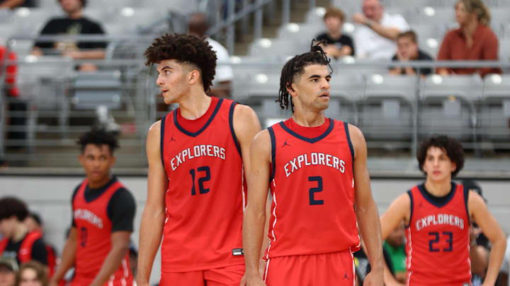 Jun 25, 2023; Glendale, AZ, USA; Columbus player Cameron Boozer (12) and brother Cayden Boozer (2) during the Section 7 high school boys tournament at State Farm Stadium. Mandatory Credit: Mark J. Rebilas-Imagn Images