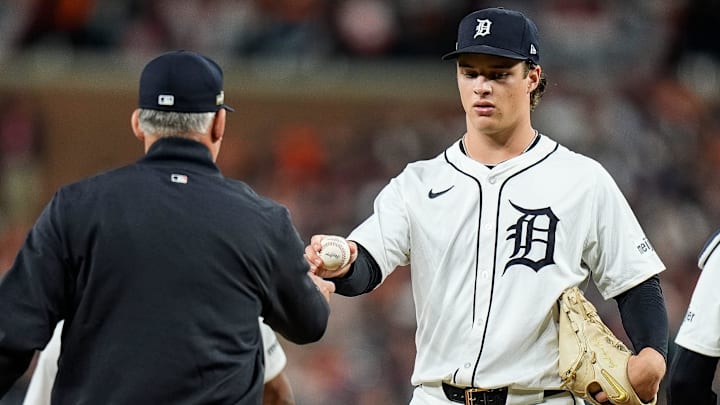 Detroit Tigers pitcher Jackson Jobe (21) hands the ball to manager A.J. Hinch (14) for pitching change against Cleveland Guardians during the ninth inning at Game 4 of ALDS at Comerica Park in Detroit on Thursday, Oct. 10, 2024.