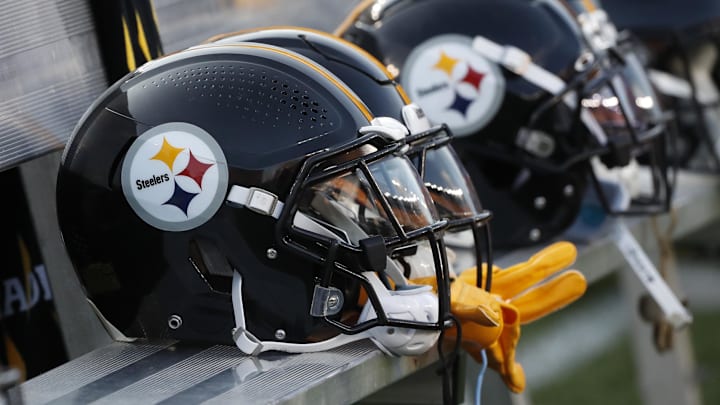 Aug 9, 2024; Pittsburgh, Pennsylvania, USA;  Pittsburgh Steelers helmets on the bench during the game against the Houston Texans during the first quarter at Acrisure Stadium. Mandatory Credit: Charles LeClaire-Imagn Images