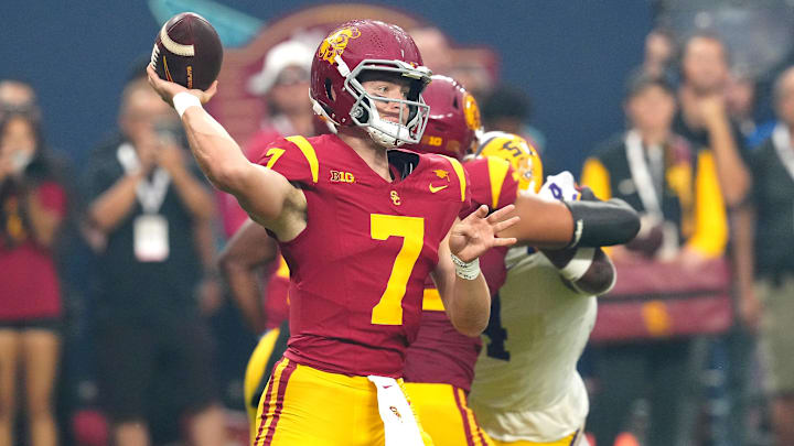 Sep 1, 2024; Paradise, Nevada, USA; Southern California Trojans quarterback Miller Moss (7) throws a pass against the LSU Tigers during the first quarter at Allegiant Stadium. Mandatory Credit: Stephen R. Sylvanie-Imagn Images Sep 1, 2024; Paradise, Nevada, USA; Southern California Trojans quarterback Miller Moss (7) throws a pass against the LSU Tigers during the first quarter at Allegiant Stadium. Mandatory Credit: Stephen R. Sylvanie-Imagn Images