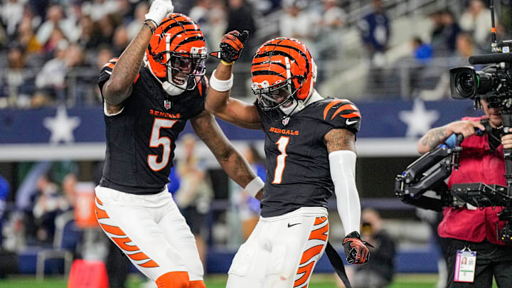 Cincinnati Bengals wide receiver Tee Higgins (5) and wide receiver Ja'Marr Chase (1) dance after Chase scored a touchdown in the 4th quarter to beat the Dallas Cowboys in Monday Night Football at AT&T Stadium in Arlington, Texas on Monday, December 9, 2024.
