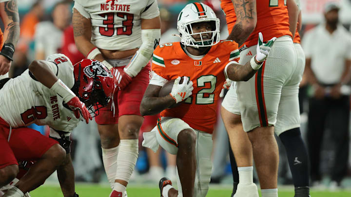 Nov 15, 2025; Miami Gardens, Florida, USA; Miami Hurricanes wide receiver Ny Carr (12) reacts after a carry against NC State Wolfpack during the fourth quarter at Hard Rock Stadium. Mandatory Credit: Sam Navarro-Imagn Images Nov 15, 2025; Miami Gardens, Florida, USA; Miami Hurricanes wide receiver Ny Carr (12) reacts after a carry against NC State Wolfpack during the fourth quarter at Hard Rock Stadium. Mandatory Credit: Sam Navarro-Imagn Images