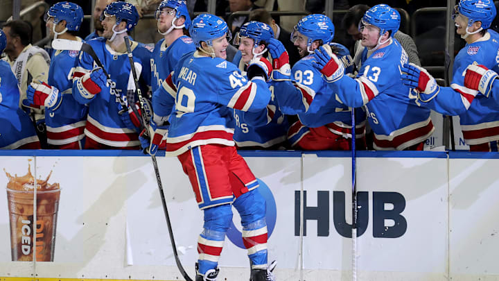 Mar 5, 2026; New York, New York, USA; New York Rangers right wing Jaroslav Chmelar (49) celebrates his first NHL goal with teammates during the third period against the Toronto Maple Leafs at Madison Square Garden. Mandatory Credit: Brad Penner-Imagn Images