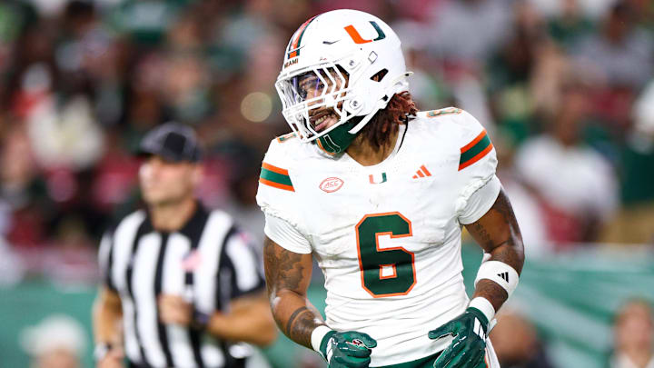 Sep 21, 2024; Tampa, Florida, USA; Miami Hurricanes running back Damien Martinez (6) reacts after scoring a touchdown against the South Florida Bulls in the third quarter at Raymond James Stadium. Mandatory Credit: Nathan Ray Seebeck-Imagn Images Sep 21, 2024; Tampa, Florida, USA; Miami Hurricanes running back Damien Martinez (6) reacts after scoring a touchdown against the South Florida Bulls in the third quarter at Raymond James Stadium. Mandatory Credit: Nathan Ray Seebeck-Imagn Images