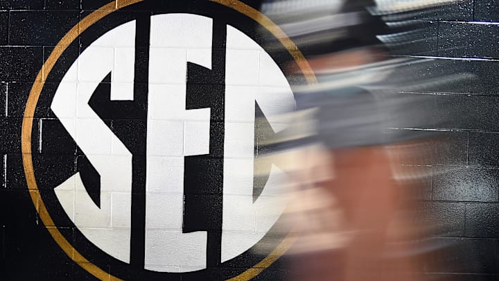 Oct 19, 2019; Nashville, TN, USA; General view of an SEC logo as a Vanderbilt Commodores player walks to the locker room at Vanderbilt Stadium. 