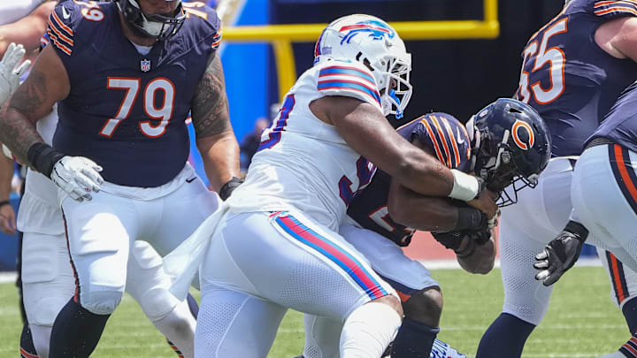Aug 10, 2024; Orchard Park, New York, USA; Buffalo Bills defensive tackle DeWayne Carter (90) tackles Chicago Bears running back Khalil Herbert (24) Aug 10, 2024; Orchard Park, New York, USA; Buffalo Bills defensive tackle DeWayne Carter (90) tackles Chicago Bears running back Khalil Herbert (24)
