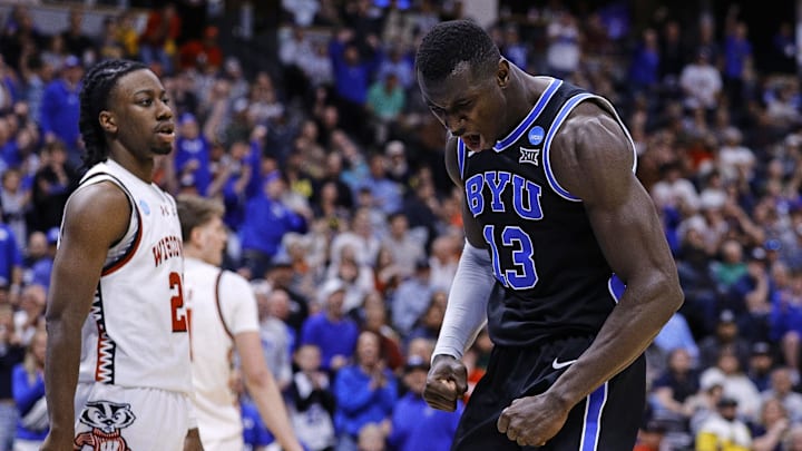 Mar 22, 2025; Denver, CO, USA; Brigham Young Cougars center Keba Keita (13) reacts against the Wisconsin Badgers during the second half in the second round of the NCAA Tournament at Ball Arena. Mandatory Credit: Isaiah J. Downing-Imagn Images Mar 22, 2025; Denver, CO, USA; Brigham Young Cougars center Keba Keita (13) reacts against the Wisconsin Badgers during the second half in the second round of the NCAA Tournament at Ball Arena. Mandatory Credit: Isaiah J. Downing-Imagn Images