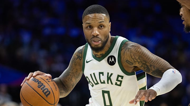 Oct 23, 2024; Philadelphia, Pennsylvania, USA; Milwaukee Bucks guard Damian Lillard (0) dribbles the ball against the Philadelphia 76ers during the first quarter at Wells Fargo Center. Mandatory Credit: Bill Streicher-Imagn Images