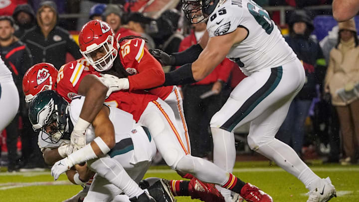 Nov 20, 2023; Kansas City, Missouri, USA; Philadelphia Eagles quarterback Jalen Hurts (1) is sacked by Kansas City Chiefs defensive tackle Chris Jones (95) and defensive end Mike Danna (51) during the first half at GEHA Field at Arrowhead Stadium. Mandatory Credit: Denny Medley-Imagn Images Nov 20, 2023; Kansas City, Missouri, USA; Philadelphia Eagles quarterback Jalen Hurts (1) is sacked by Kansas City Chiefs defensive tackle Chris Jones (95) and defensive end Mike Danna (51) during the first half at GEHA Field at Arrowhead Stadium. Mandatory Credit: Denny Medley-Imagn Images