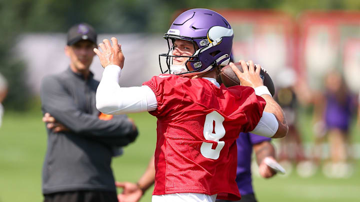 Jul 29, 2025; Eagan, MN, USA; Minnesota Vikings quarterback J.J. McCarthy (9) takes part in drills during the team's training camp at the Minnesota Vikings Training Facility.