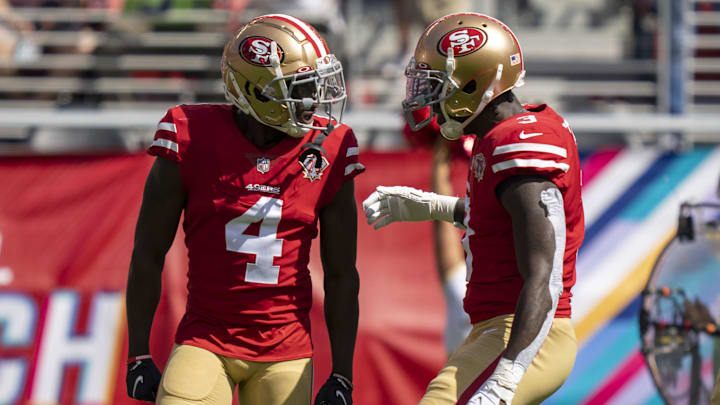 October 3, 2021; Santa Clara, California, USA; San Francisco 49ers defensive back Emmanuel Moseley (4) celebrates with strong safety Jaquiski Tartt (3) after a defensive stop against the Seattle Seahawks during the first quarter at Levi's Stadium.