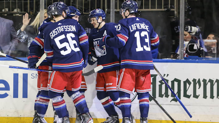 Mar 23, 2024; New York, New York, USA; New York Rangers left wing Artemi Panarin (10) is surrounded