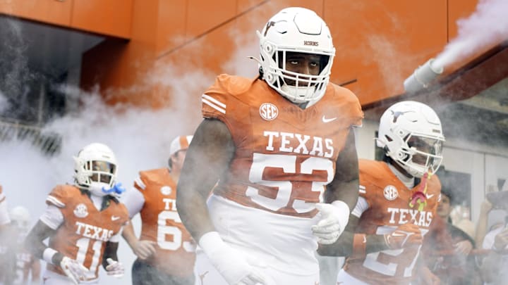 Nov 9, 2024; Austin, Texas, USA; Texas Longhorns defensive lineman Aaron Bryant (53) takes the field with teammates before a game against the Florida Gators at Darrell K Royal-Texas Memorial Stadium. Mandatory Credit: Scott Wachter-Imagn Images