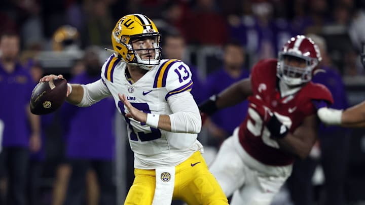 Nov 4, 2023; Tuscaloosa, Alabama, USA; LSU Tigers quarterback Garrett Nussmeier (13) throws  pass against the Alabama Crimson Tide during the second half at Bryant-Denny Stadium. Mandatory Credit: Butch Dill-Imagn Images