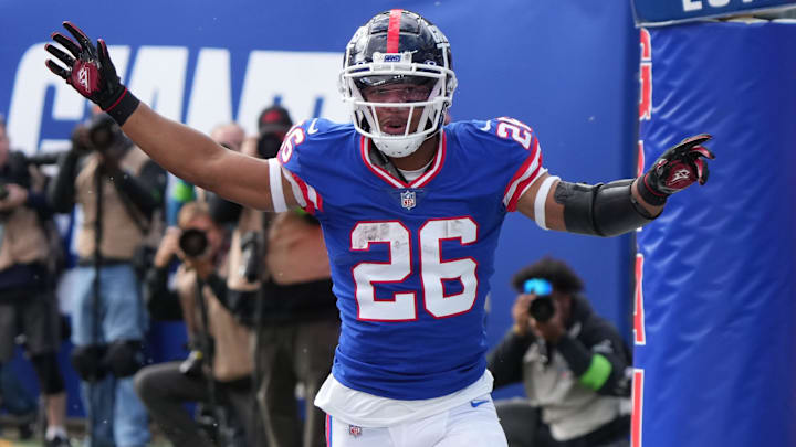 East Rutherford, NJ     October 22, 2023 -- Saquon Barkley of the Giants scored a TD on a pass play