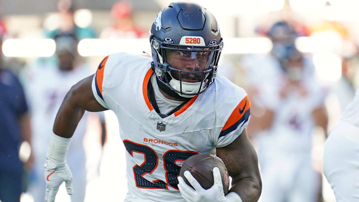 Aug 9, 2025; Santa Clara, California, USA;  Denver Broncos running back Tyler Badie (28) rushes the ball in the second quarter against the San Francisco 49ers at Levi's Stadium. 