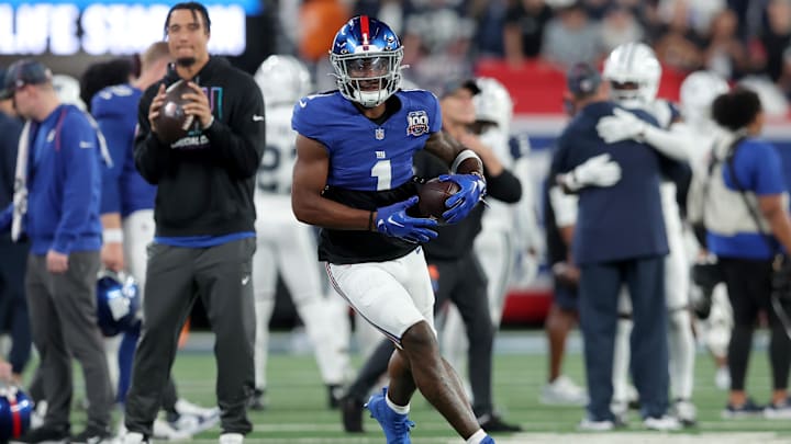 Sep 26, 2024; East Rutherford, New Jersey, USA; New York Giants wide receiver Malik Nabers (1) warms up before a game against the Dallas Cowboys at MetLife Stadium. Sep 26, 2024; East Rutherford, New Jersey, USA; New York Giants wide receiver Malik Nabers (1) warms up before a game against the Dallas Cowboys at MetLife Stadium.