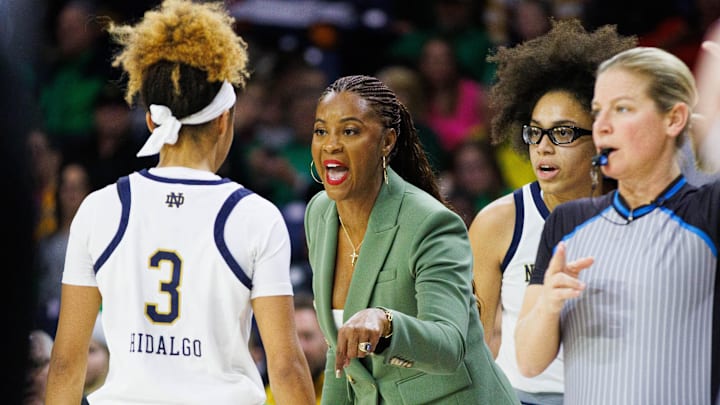 Notre Dame head coach Niele Ivey coaches guard Hannah Hidalgo (3) during a NCAA women's basketball game between Notre Dame and SMU at Purcell Pavilion on Sunday, Jan. 19, 2025, in South Bend.