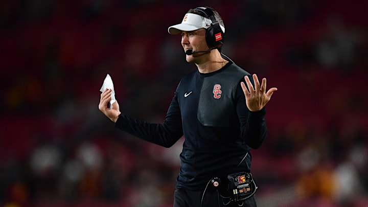Sep 20, 2025; Los Angeles, California, USA; Southern California Trojans head coach Lincoln Riley watches game action against the Michigan State Spartans during the second half at the Los Angeles Memorial Coliseum. Mandatory Credit: Gary A. Vasquez-Imagn Images
