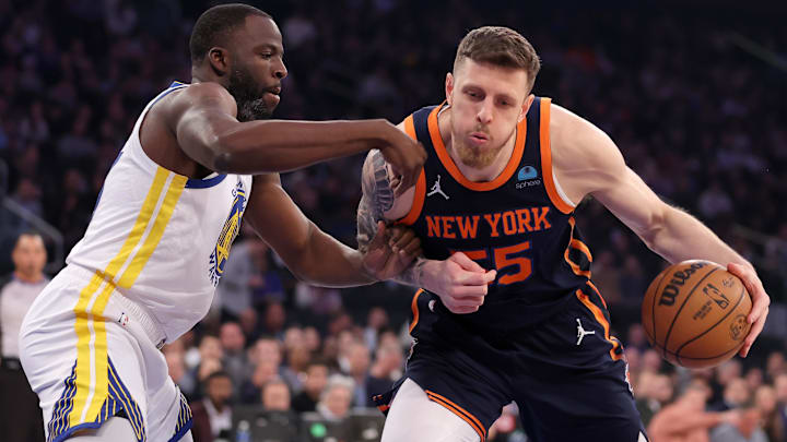 Feb 29, 2024; New York, New York, USA; New York Knicks center Isaiah Hartenstein (55) controls the ball against Golden State Warriors forward Draymond Green (23) during the first quarter at Madison Square Garden. Mandatory Credit: Brad Penner-Imagn Images Feb 29, 2024; New York, New York, USA; New York Knicks center Isaiah Hartenstein (55) controls the ball against Golden State Warriors forward Draymond Green (23) during the first quarter at Madison Square Garden. Mandatory Credit: Brad Penner-Imagn Images
