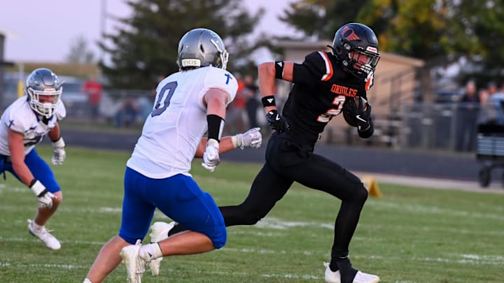 Lennox wide receiver Drake Mikkelsen (2) runs with the ball on Friday, Sept. 13, 2024, at Lennox High School in Lennox, South Dakota.
