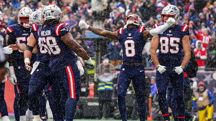 Dec 14, 2025; Foxborough, Massachusetts, USA; New England Patriots wide receiver Stefon Diggs (8) reacts after a touchdown by quarterback Drake Maye (10) (not pictured) against the Buffalo Bills in the first half at Gillette Stadium. Mandatory Credit: David Butler II-Imagn Images