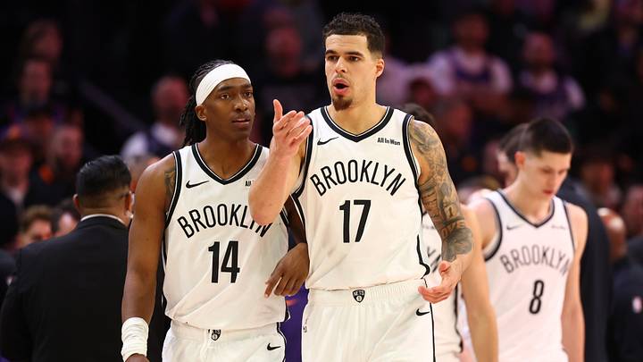 Jan 27, 2026; Phoenix, Arizona, USA; Brooklyn Nets forward Michael Porter Jr. (17) and guard Terance Mann (14) against the Phoenix Suns at Mortgage Matchup Center. Mandatory Credit: Mark J. Rebilas-Imagn Images