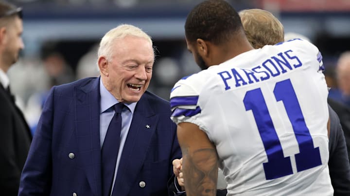 Jan 16, 2022; Arlington, Texas, USA; Dallas Cowboys owner Jerry Jones meets with outside linebacker Micah Parsons (11) prior to the NFC Wild Card playoff football game against the San Francisco 49ers at AT&T Stadium. Mandatory Credit: Kevin Jairaj-Imagn Images